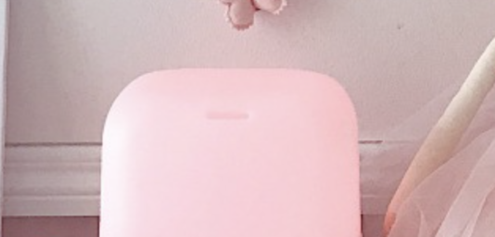 pink and wooden ultrasonic vaporiser in a bedroom